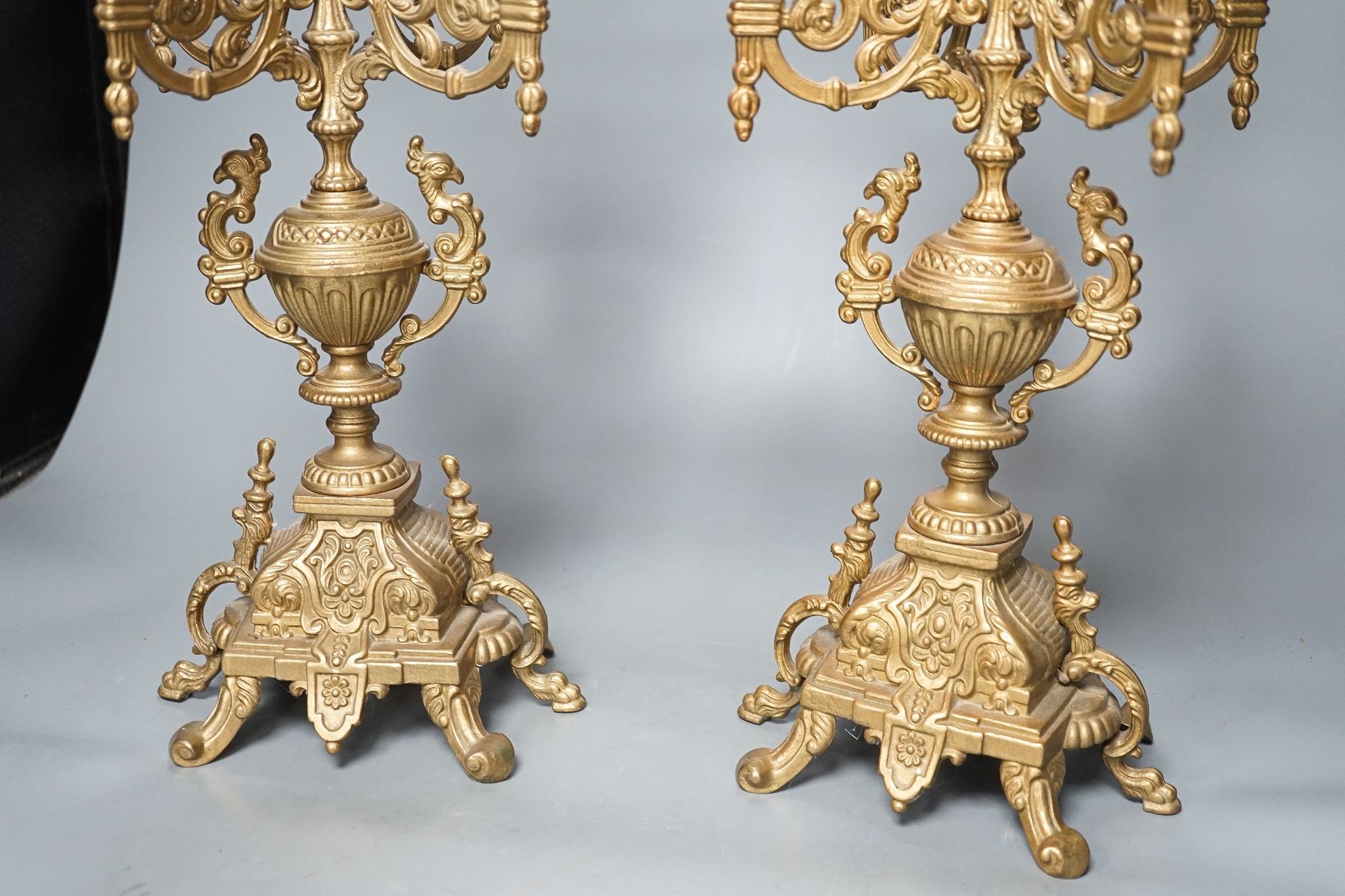 A large pair of ornate baroque style gilt-brass candelabra, 51cm